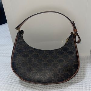 AVA BAG IN TRIOMPHE CANVAS AND CALFSKIN
TAN